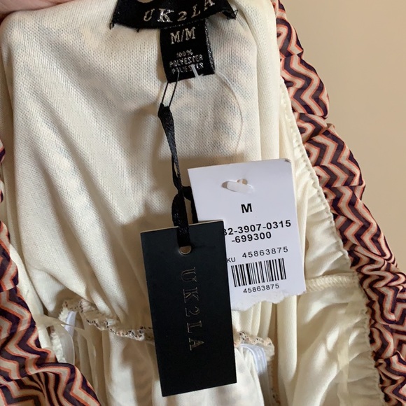 Sleeveless Geometric high-low Dress - Picture 2 of 3